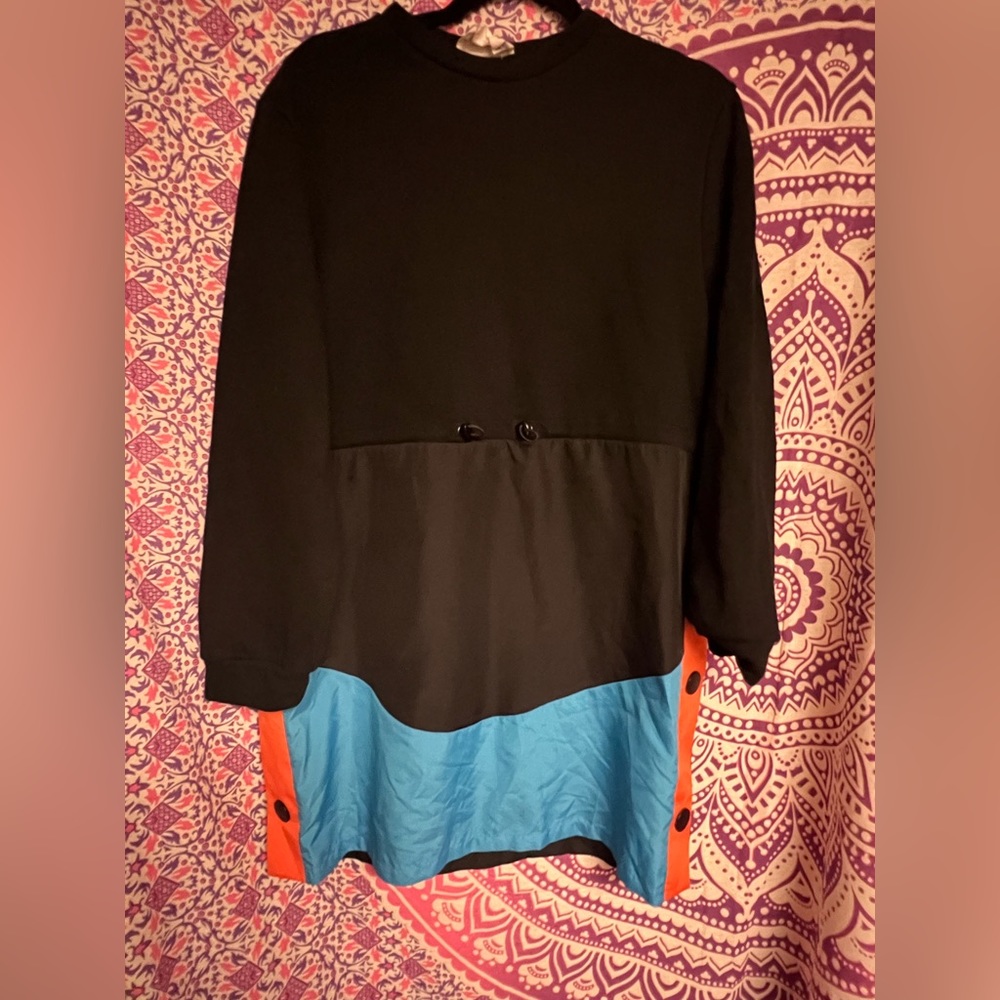 Black dress with buttons on the side. Cute for night out.